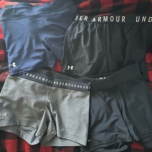 4 pairs of underarmour shorts